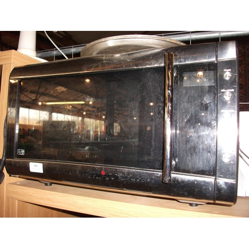 69 - BREVILLE MICROWAVE OVEN WITH GRILL - WARRANTED UNTIL 12 NOON TUES FOLLOWING THE ABOVE SALE