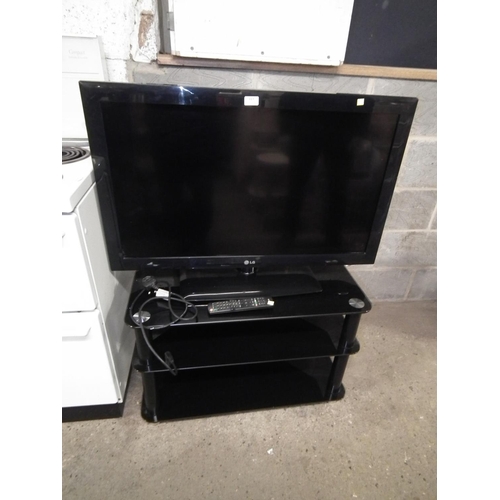 113 - LG 37'' FLAT SCREEN TV WITH REMOTE AND STAND - WARRANTYED UNTIL NOON TUES FOLLOWING THE ABOVE SALE