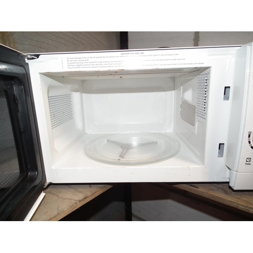 123 - MICROWAVE - WARRANTED UNTIL 12 NOON ON TUESDAY FOLLOWING THE ABOVE SALE