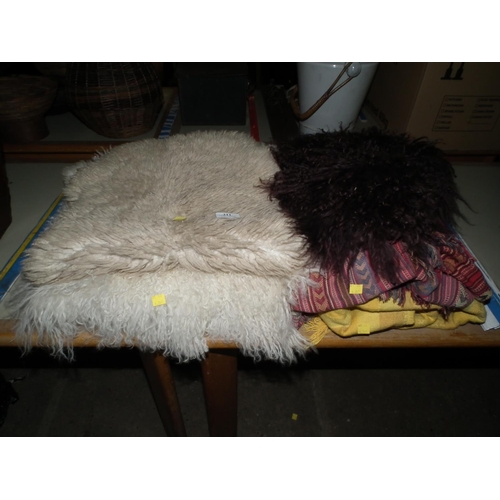 211 - 2 SHEEPSKIN ITEMS/RUG