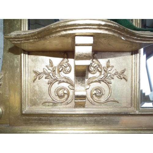 390 - DECORATIVE BEVEL EDGED OVERMANTLE MIRROR IN GILT