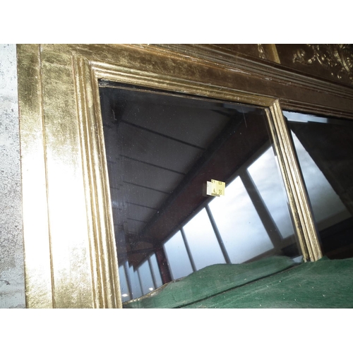 390 - DECORATIVE BEVEL EDGED OVERMANTLE MIRROR IN GILT