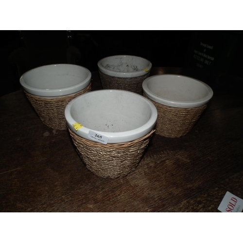 265 - 4 X CERAMIC & WICKER PLANT POTS