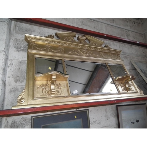 390 - DECORATIVE BEVEL EDGED OVERMANTLE MIRROR IN GILT