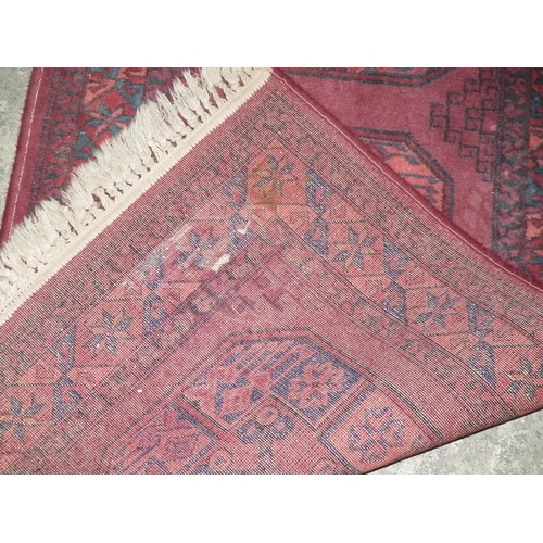 409 - PATTERENED RUG 134 X 69