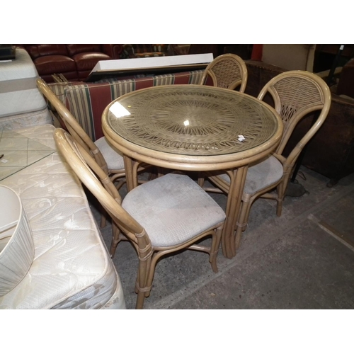 457 - CANE GLASS TOP TABLE & 4 CHAIRS