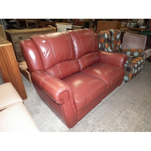 472 - 2 SEATER RED LEATHER RECLINING SETTEE