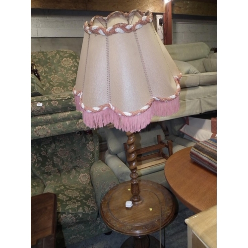 487 - CARVED OAK BARLEY TWIST STANDARD LAMP/TABLE - WARRANTED UNTIL 12 NOON ON TUESDAY FOLLOWING THE ABOVE... 