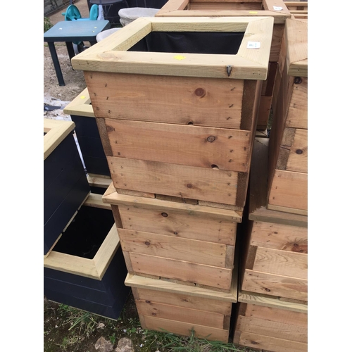 35 - 3 WOODEN PLANTERS