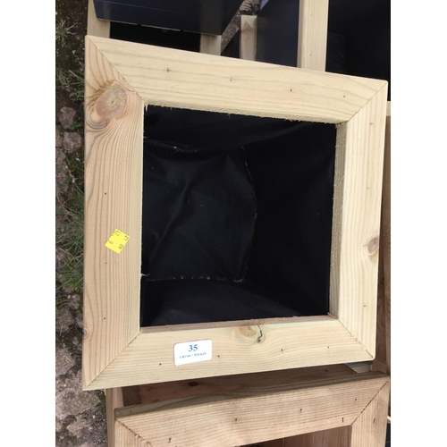 35 - 3 WOODEN PLANTERS