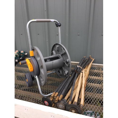 4 - HOZELOCK HOSE REEL ON WHEELS & DRAIN RODS ETC.