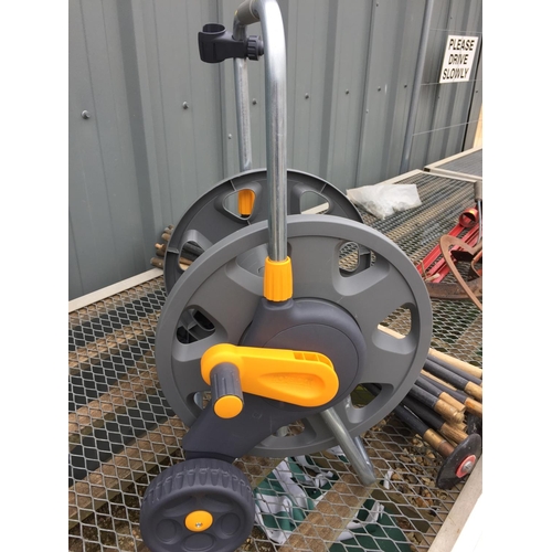 4 - HOZELOCK HOSE REEL ON WHEELS & DRAIN RODS ETC.
