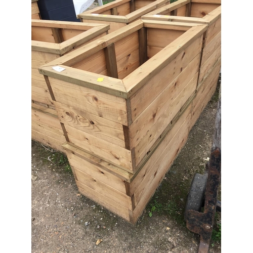 42 - 2 X WOODEN PLANTERS