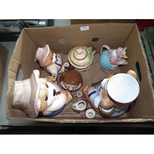 260 - BOX OF TEDDY TEAPOTS & 1 BISCUIT BARRELL