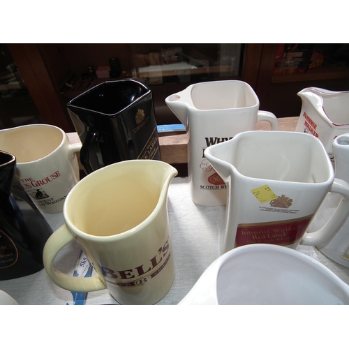 476 - SET OF 10 CERAMIC JUGS