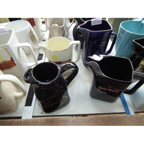 477 - SET OF 10 CERAMIC JUGS