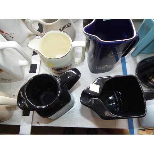 477 - SET OF 10 CERAMIC JUGS