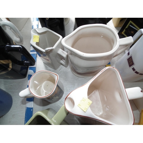 479 - SET OF 10 CERAMIC JUGS