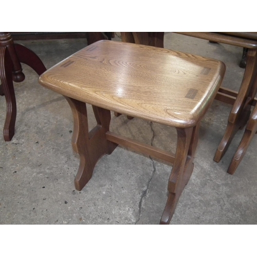 559 - ERCOL NEST OF 3 TABLES