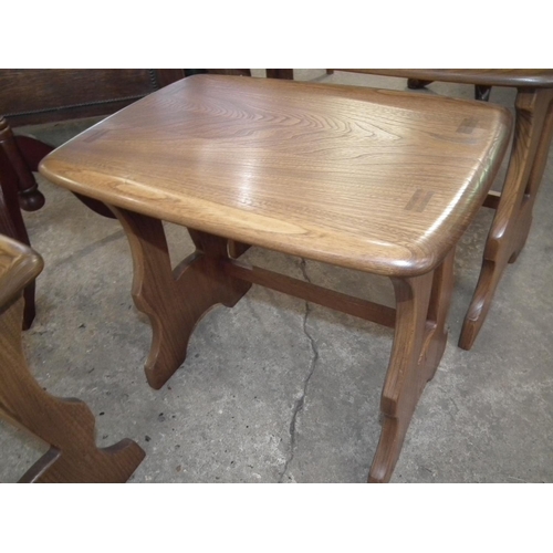 559 - ERCOL NEST OF 3 TABLES