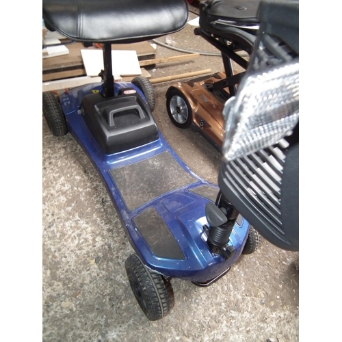 76 - LIBERTY MOBILITY SCOOTER - CHARGER WARRANTED UNTIL NOON TUES FOLLOWING THE ABOVE SALE