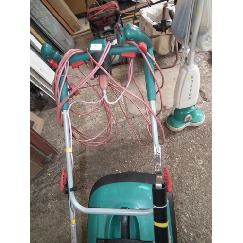 64 - BOSCH ELECTRIC LAWN MOWER - WARRANTED UNTIL 12 NOON ON THE TUESDAY FOLLOWING THE ABOVE SALE