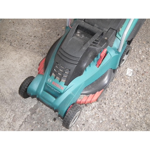 64 - BOSCH ELECTRIC LAWN MOWER - WARRANTED UNTIL 12 NOON ON THE TUESDAY FOLLOWING THE ABOVE SALE