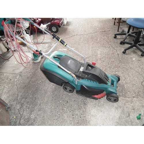 64 - BOSCH ELECTRIC LAWN MOWER - WARRANTED UNTIL 12 NOON ON THE TUESDAY FOLLOWING THE ABOVE SALE