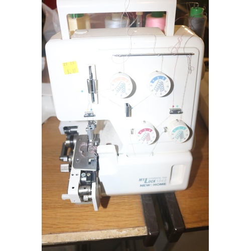 63 - MY LOCK 134D NEW HOME OVERLOCK SEWING MACHINE WITH BAG OF BITS - WARRANTED UNTIL 12 NOON ON TUESDAY ... 