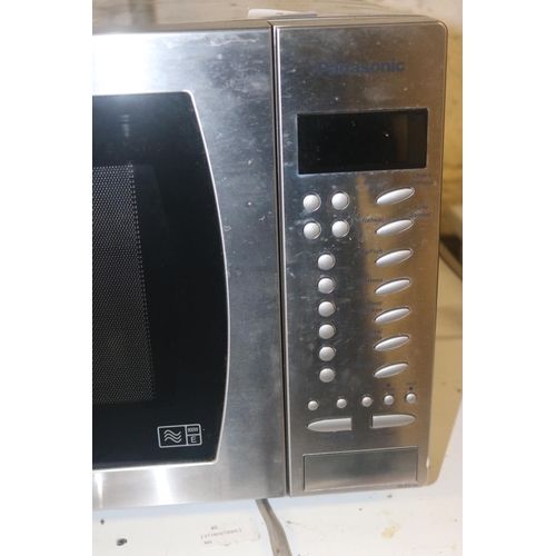 74 - PANASONIC MICROWAVE OVEN - WARRANTED UNTIL 12 NOON ON TUESDAY FOLLOWING THE ABOVE SALE