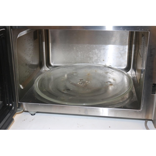 74 - PANASONIC MICROWAVE OVEN - WARRANTED UNTIL 12 NOON ON TUESDAY FOLLOWING THE ABOVE SALE