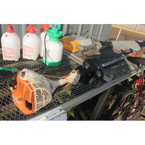 11 - STIHL PETROL STRIMMER