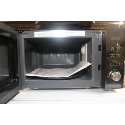 150 - RUSSELL HOBBS MICROWAVE - WARRANTED UNTIL 12 NOON ON TUESDAY FOLLOWING THE ABOVE SALE