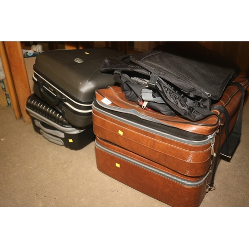 244 - QTY OF VARIOUS SUITCASES