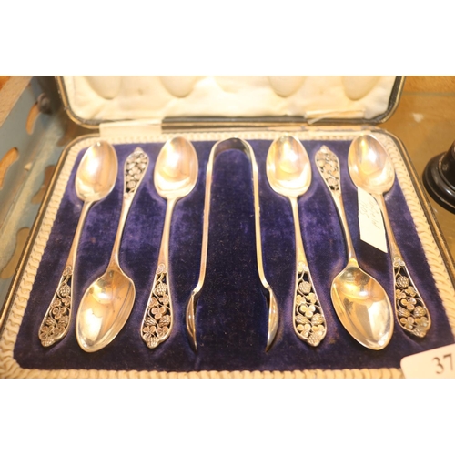 374 - SET OF SILVER SPOONS, CUP & SILVER TOPPED PERFUME