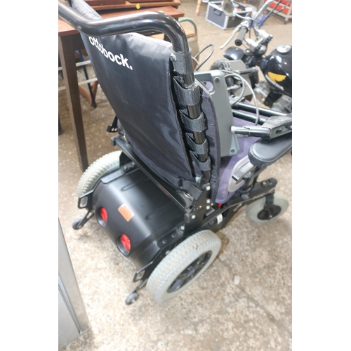 52 - BLACK ELECTRIC WHEELCHAIR - CHARGER WARRANTED UNTIL NOON TUES FOLLOWING THE ABOVE SALE