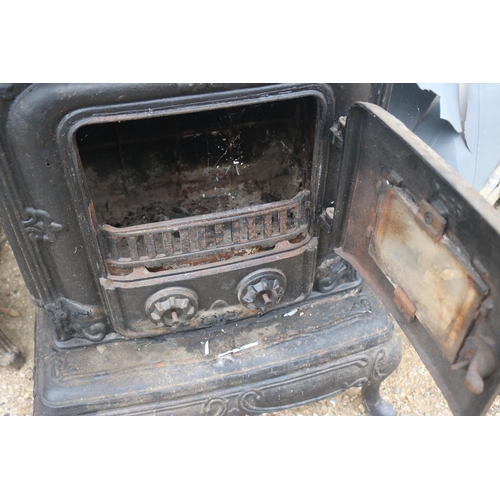 100 - FRENCH CAST IRON STOVE WITH STANDING PIPES