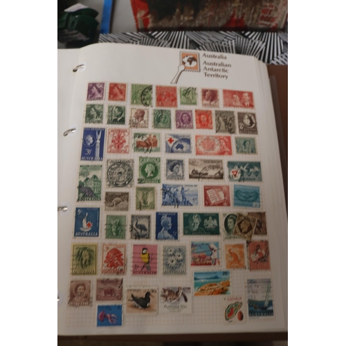 583 - INTERNATIONAL STAMP ALBUM & BOX OF STAMPS