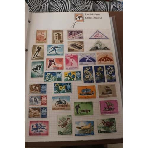 583 - INTERNATIONAL STAMP ALBUM & BOX OF STAMPS