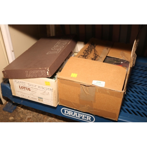 239 - 2 BOXES OF BRASS DOOR FURNITURE