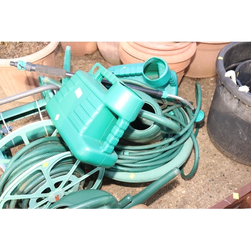 36 - VARIOUS LEGTHS OF HOSEPIPE/WATERING CANS/REELS/PLANTER