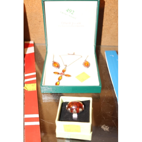 492 - AMBER SILVER CROSS & PAIR OF DROP EARRINGS & CHAIN WITH OVAL STONE IN SILVER RING BOTH BOXED