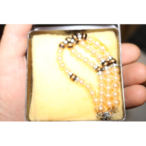 513 - 1 BOX OF COSTUME JEWELLERY