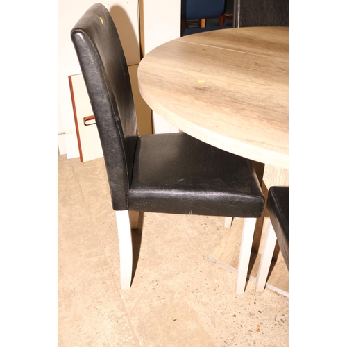 665 - MODERN ROUND EXTENDING TABLE WITH 4 CHAIRS (LEAF UNDER)