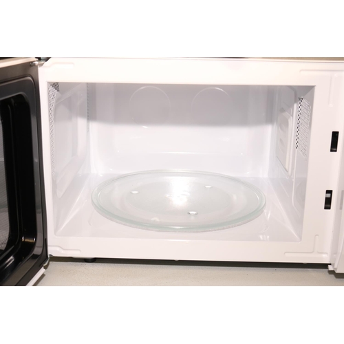 106 - TOWER MICROWAVE - WARRANTED UNTIL 12 NOON TUESDAY FOLLOWING THE ABOVE SALE