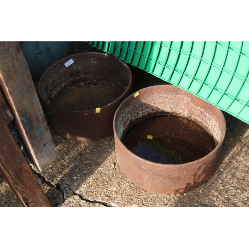 77 - PAIR OF CAST IRON FEEDERS