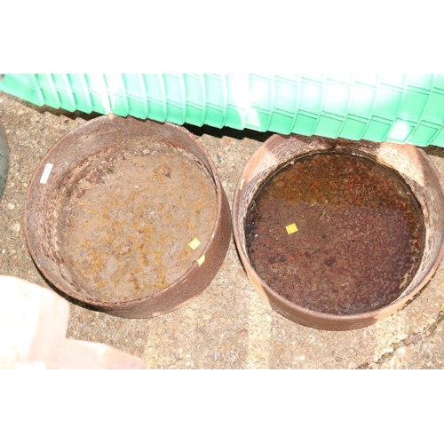 77 - PAIR OF CAST IRON FEEDERS