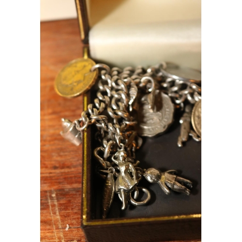 482 - SILVER CHARM BRACELET - 98 GRAMS