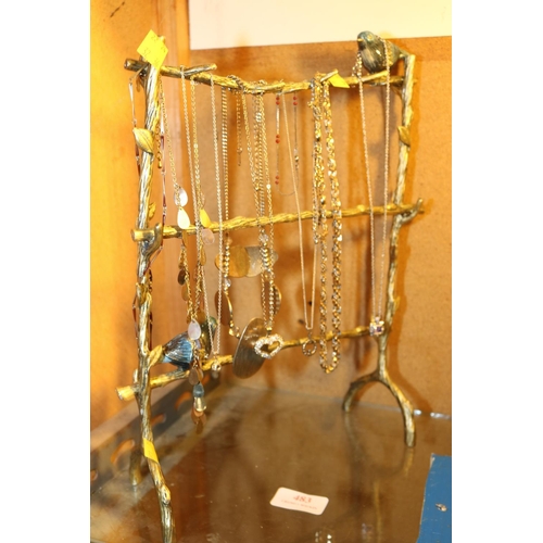 483 - UNUSUAL ENAMELLED BUD DESIGN JEWELLERY STAND WITH NECKLACES