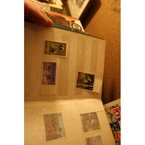 496 - 7 BRITISH ISLES STAMP COLLECTING BOOKS & STAMPS